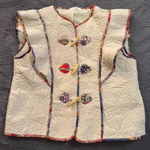 Vestique Beige Vest with Vibrant Details